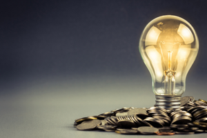Picture of a lightbulb and coins