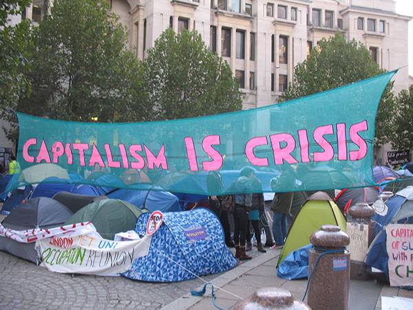 Capitalism is Crisis demonstration banner at Occupy!