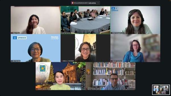 A virtual meeting with nine participants in a video call grid, each in individual frames, some with bookshelves and logos in the background.