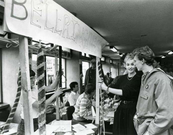 One of Geoffrey Pelham-Lane’s fondest memories during his time at UEA was helping to establish a wine society. Pictured are several students chatting and setting up a stall for their society.