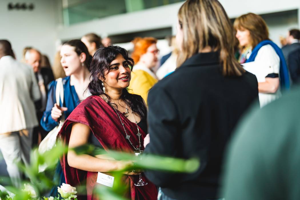 Scholar Afreen Khan, recipient of the Sonny and Gita Mehta India Scholarship, (left), with guests