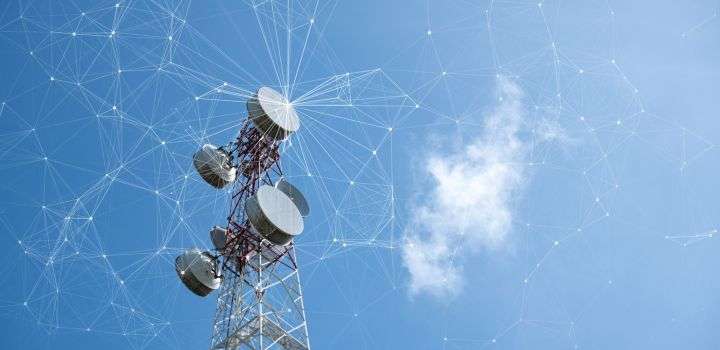 A telecommunications tower with multiple satellite dishes against a blue sky, overlaid with a digital network pattern.