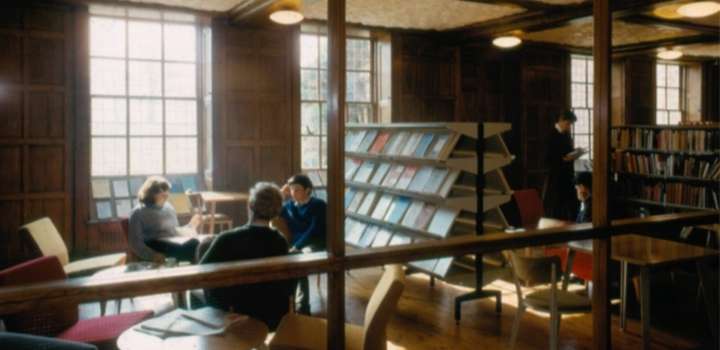 People sat in a library.