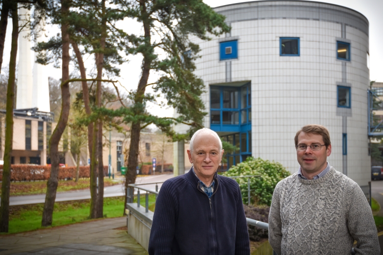 Prof Tim Osborne and Prof Phil Jones outside Climatic Research Unit building on UEA campus