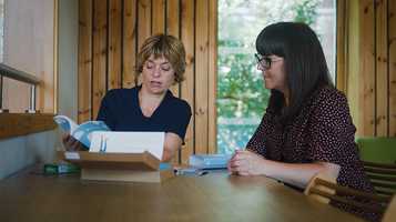 A professor and a healthcare professional discuss a new smoking cessation intervention.