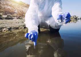 Scientist taking a water sample