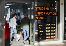 People-walking-though-door-to-the-Student-Information-Zone-siz-icon_51829.jpg