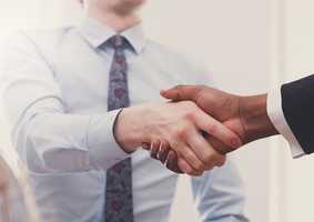 Two people shaking hands