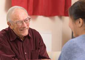 Elderly gentleman with student home visit