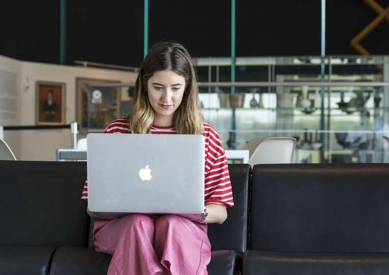 Student with Macbook