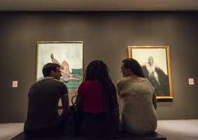 UEA researchers in front of artworks at the Sainsbury Centre