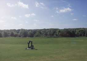 campus landscape with statue