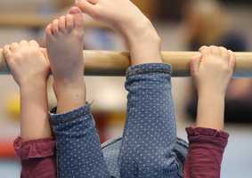 nursery child swinging on apparatus