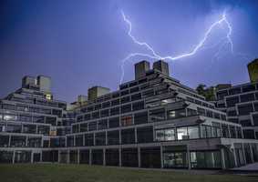 The UEA ziggurats with lightning in the background