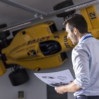 engineering student with car