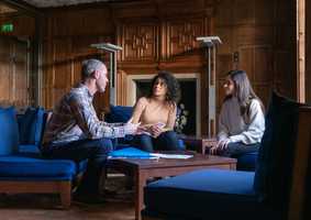 People sitting down in Earlham Hall