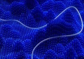 Glass pipe through a blue graph
