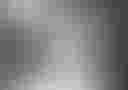Loading Black and white photo of two people holding hands...