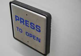 Press to open door button