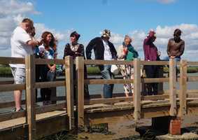 People standing on a bridge