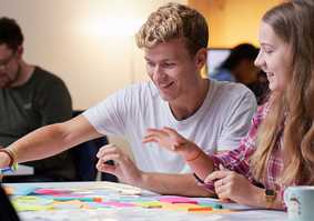 Norwich Business School students working 