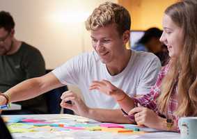 Norwich Business School students working 