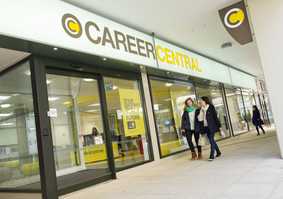 two students walking outside careers central 