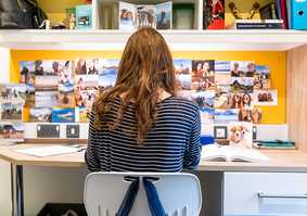 international-accommodation-girl-at-desk.jpg
