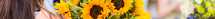 graduate holding flowers