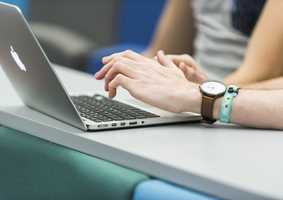 norwich-business-school-person-typing-on-laptop.jpg