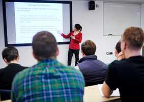Students in an economic lecture