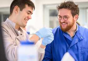 Researchers in lab