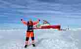 Prof Karen Heywood walking off the ship onto the sea ice