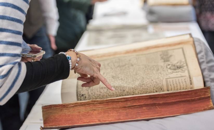 Woman pointing at a page