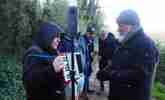 A group meets with artist Ian Brownlie