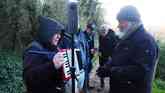 A group meets with artist Ian Brownlie