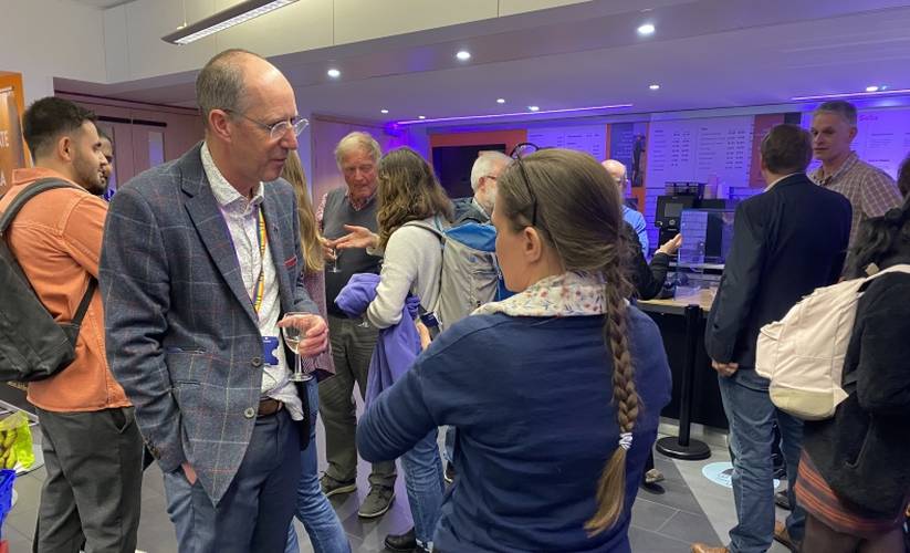 VC David Richardson talking with attendees