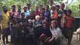 Village and Scientists posing after discussions on the future