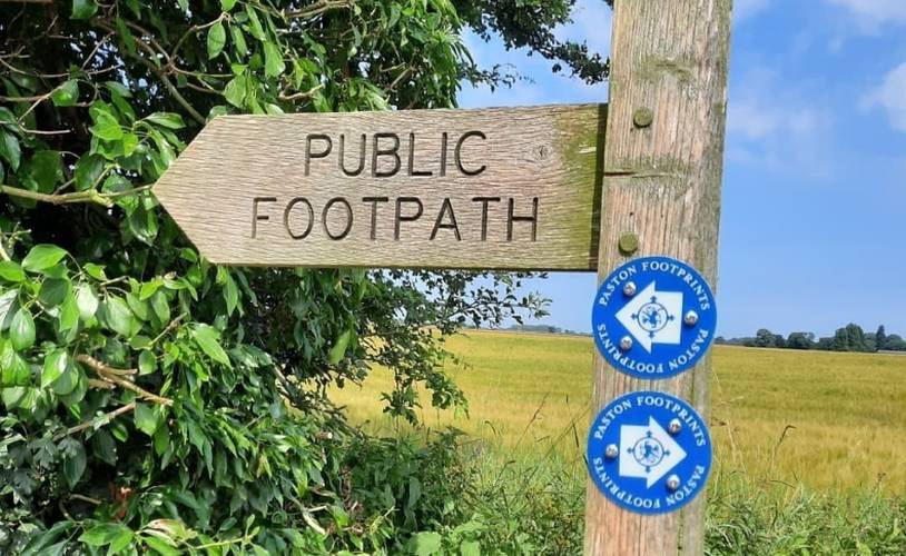 Paston Footprints sign on a signpost