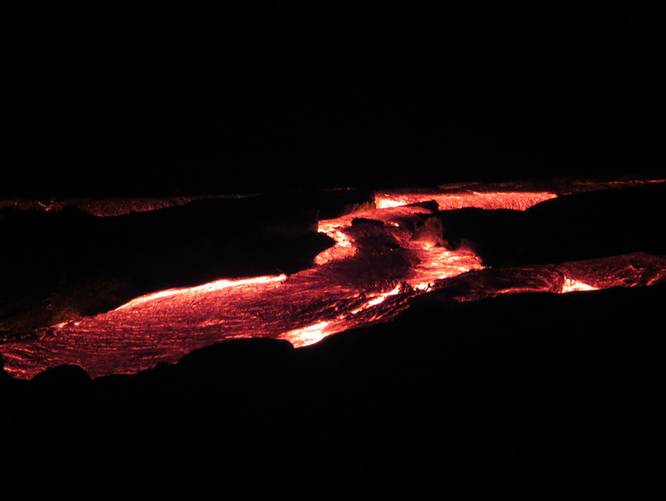 Rivers of molten lava from Kilauea volcano at Kalapana, Hawaii