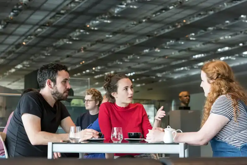 Students discussing at table