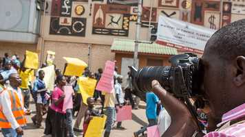 photographer-covering_a_march_in_Kampala_Uganda (2).jpg