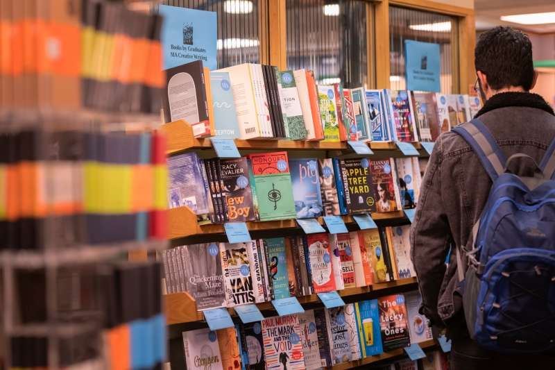 Girl in creative writing workshop at book shop