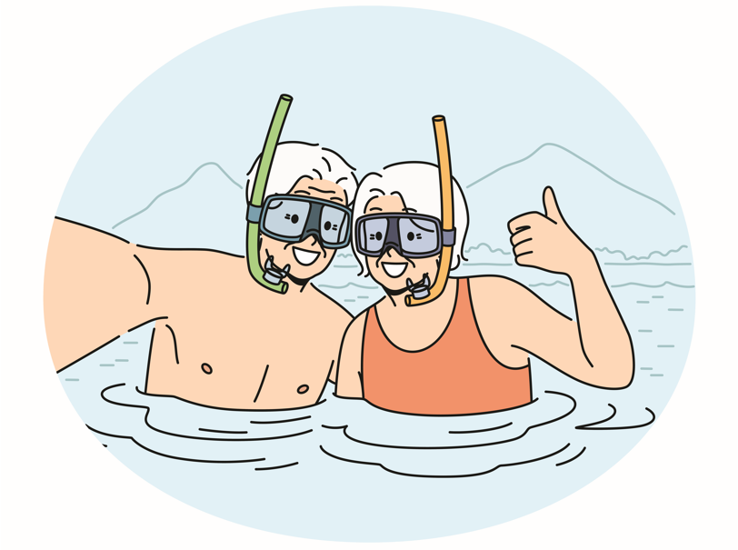 Older man and woman snorkelling