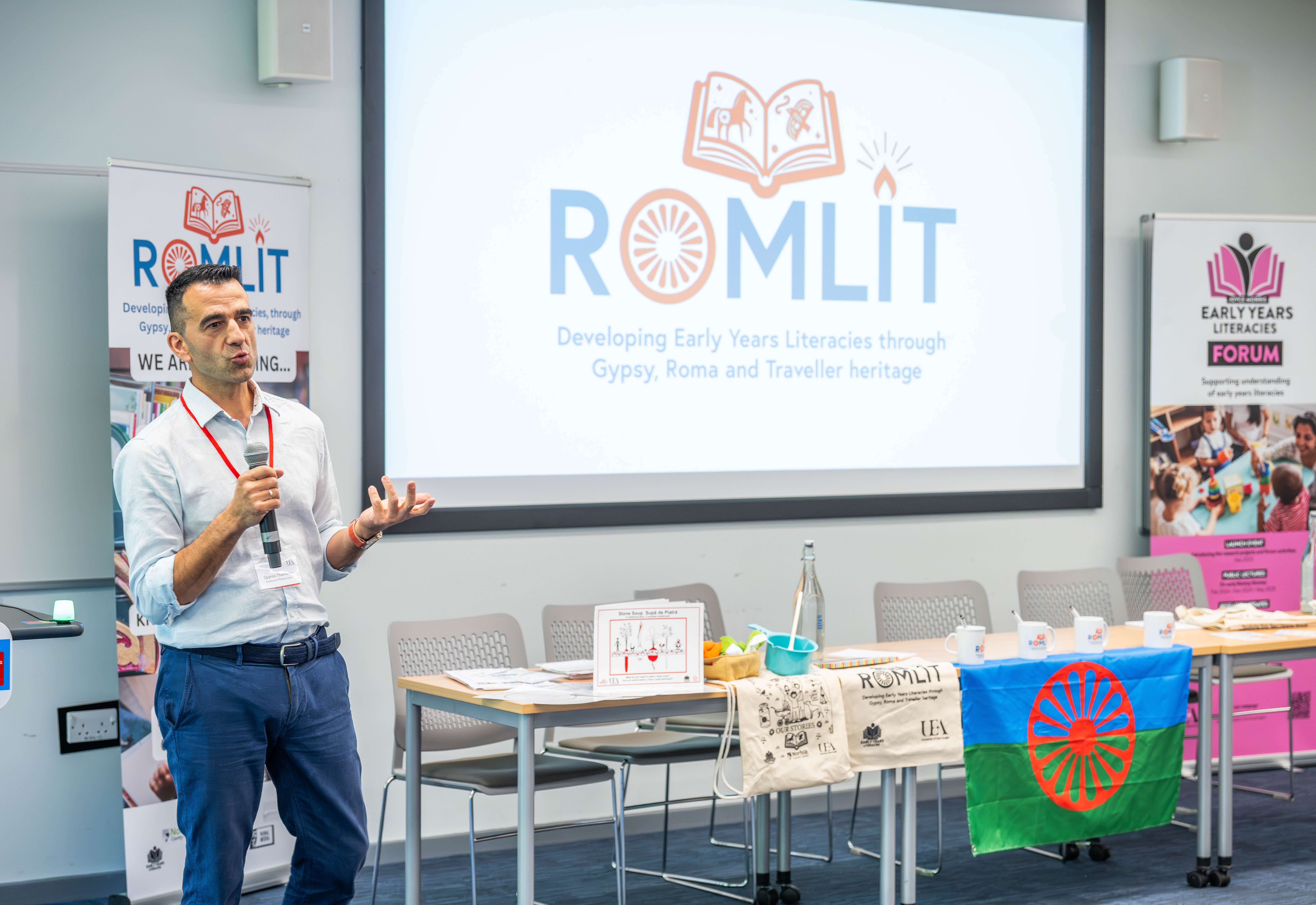 A researcher presents at a University of East Anglia conference on the ROMLIT project, developing literacies through Gypsy, Roma & Traveller heritage.