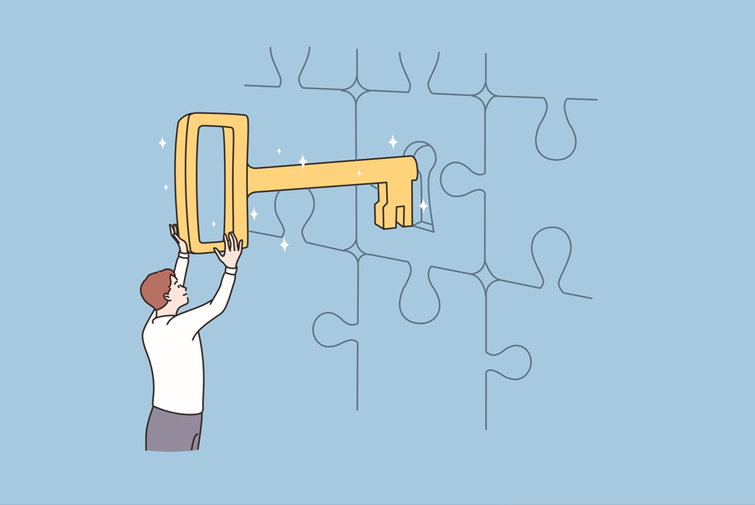 man putting giant key into keyhole