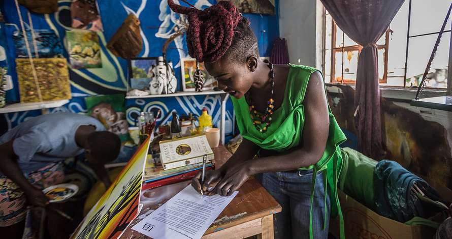 DEV_Ugandan_women_signing_consent_form.jpg