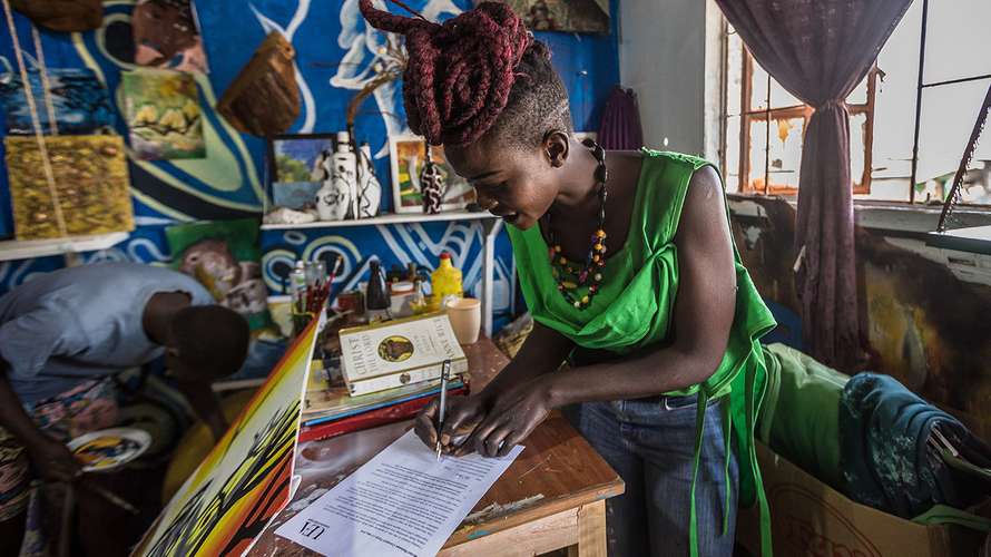 DEV_Ugandan_women_signing_consent_form.jpg