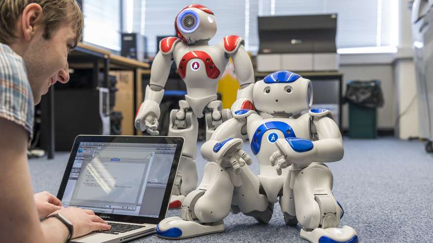 computing_student_and_robot.jpg
